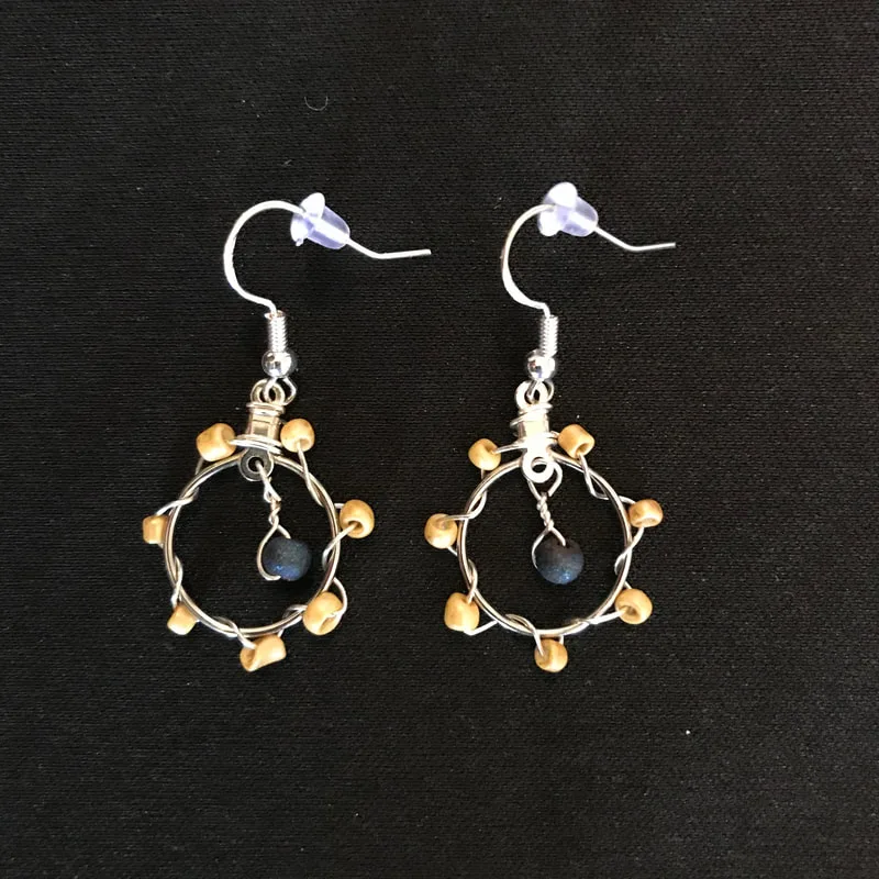 small circle earrings with blue and gold beads