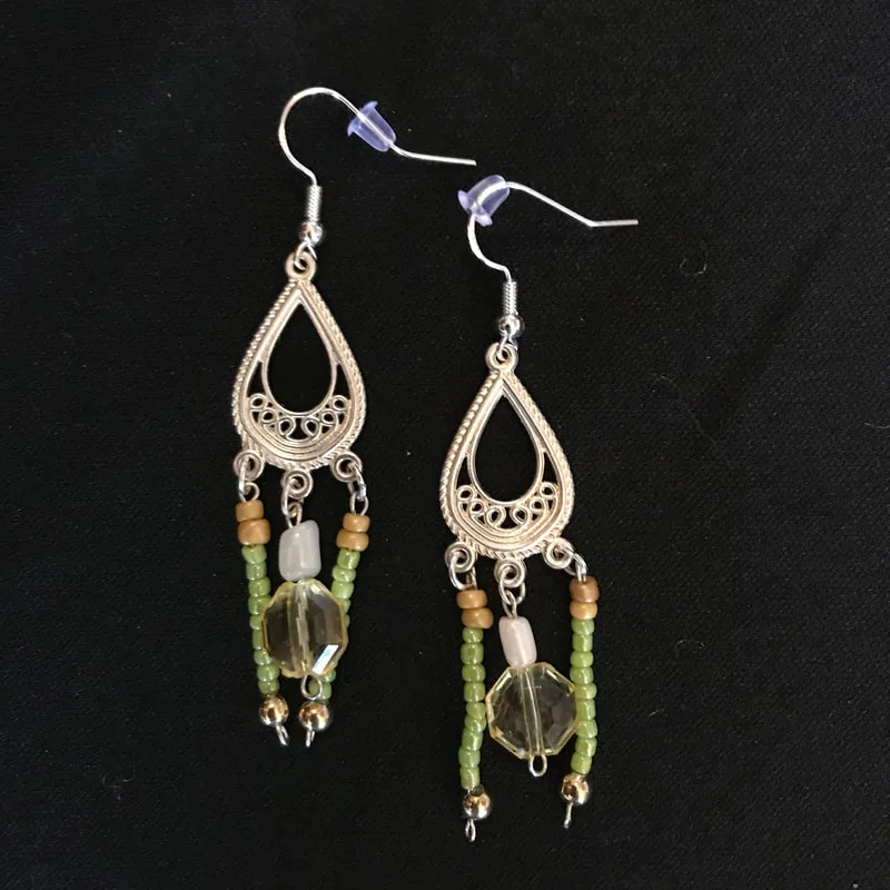 drop earrings with green, yellow, gold, and white beads