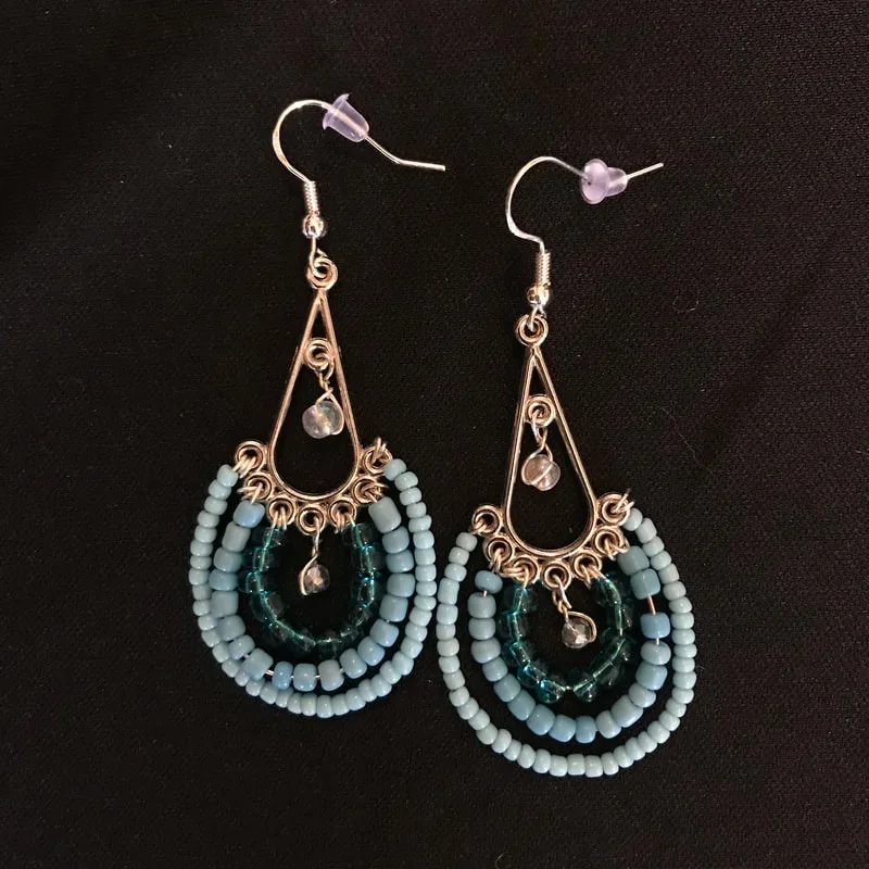 drop earrings with clear beads and blue beads in all shades